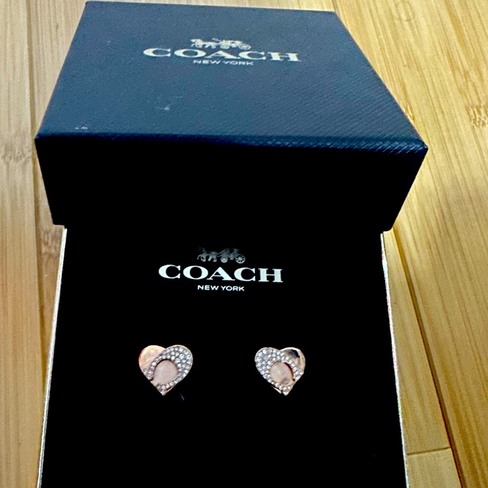 Signature Coach heart stud earrings in rose gold.  Used 4 times.  Like new.